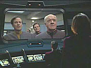 Admirál Paris a Reg Barclay vítají Voyager